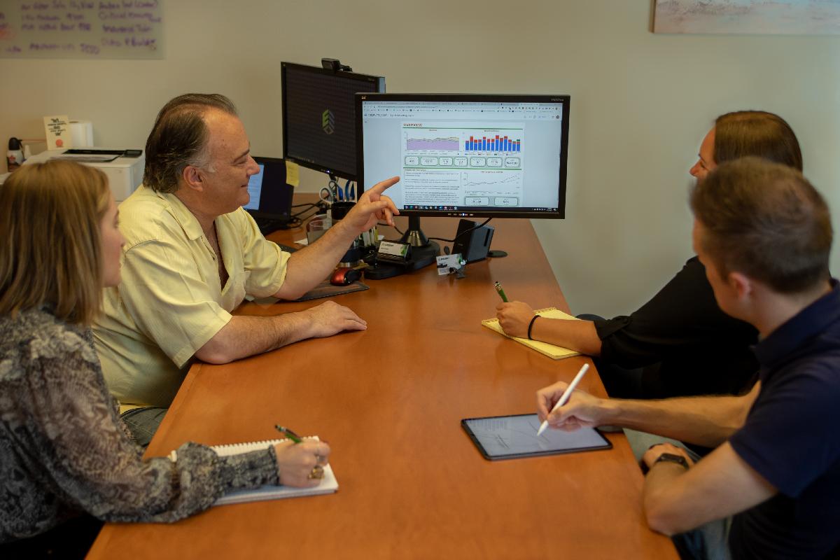 People looking at a computer screen