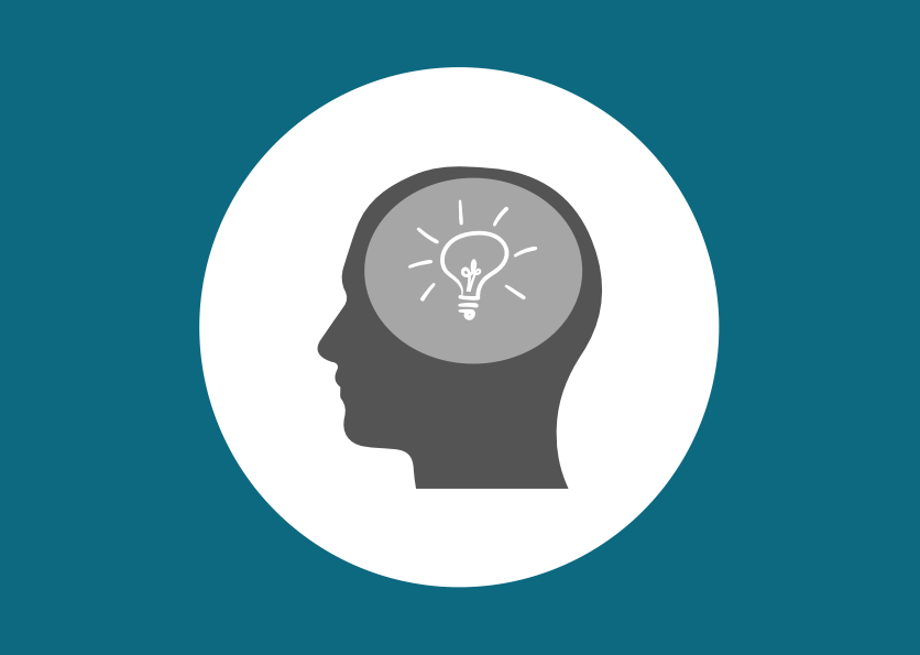 An illustration of a human head’s silhouette with a bright lightbulb in their brain