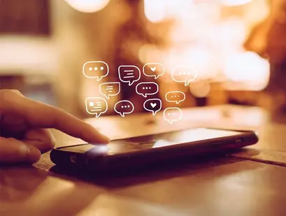 A website visitor interacts with a B2B site that features responsive mobile desi